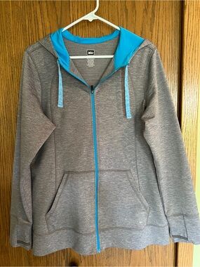 REI Gray zip up sweatshirt  with bright teal hood trim